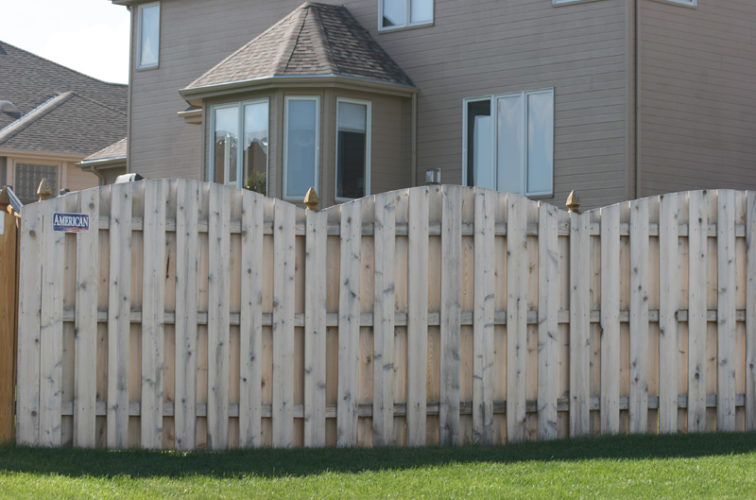 AmeriFence Corporation Wichita - Wood Fencing, 1012 6' overscallop board on board no stained