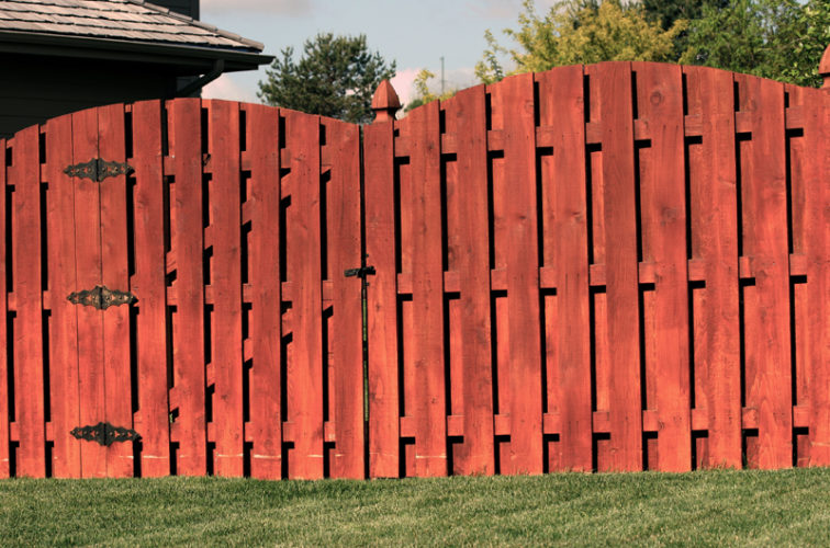 AmeriFence Corporation Wichita - Wood Fencing, 1014 6' overscallop board on board stained 4