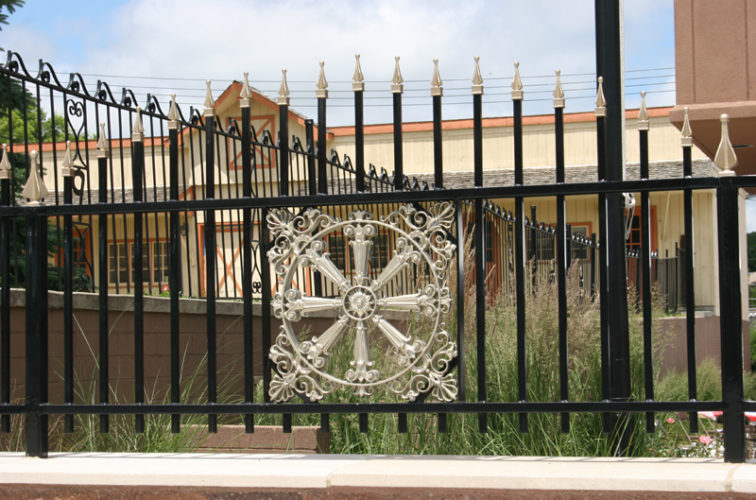 AmeriFence Corporation Wichita - Custom Iron Gate Fencing, 1231 Overscallop with quadflare & emblem