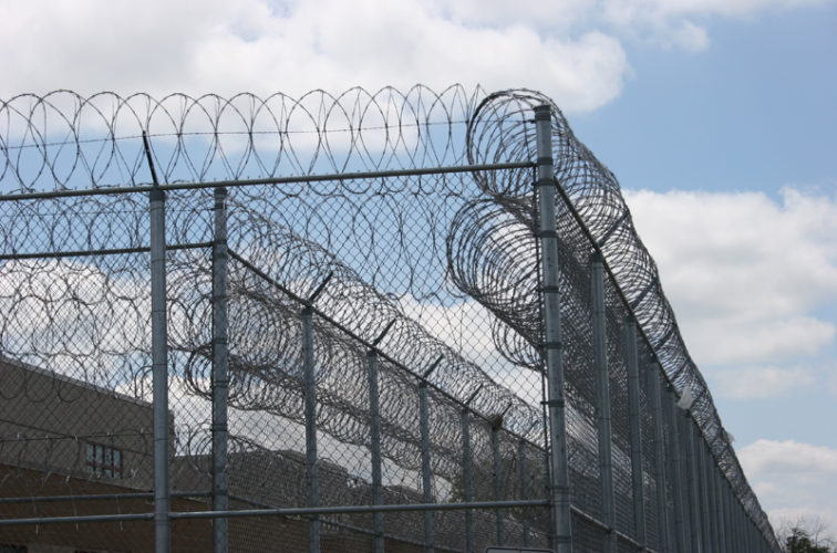 AmeriFence Corporation Wichita - High Security Fencing, 2102 Correctional fence with Concertina wire