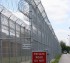 AmeriFence Corporation Wichita - High Security Fencing, 2103 Correctional fence with Concertina wire
