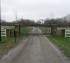 AmeriFence Corporation Wichita - Custom Gates, Country Overscallop Estate Gate with Letter Infill