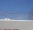 AmeriFence Corporation Wichita - High Security Fencing, Four Stack Concertina Wire